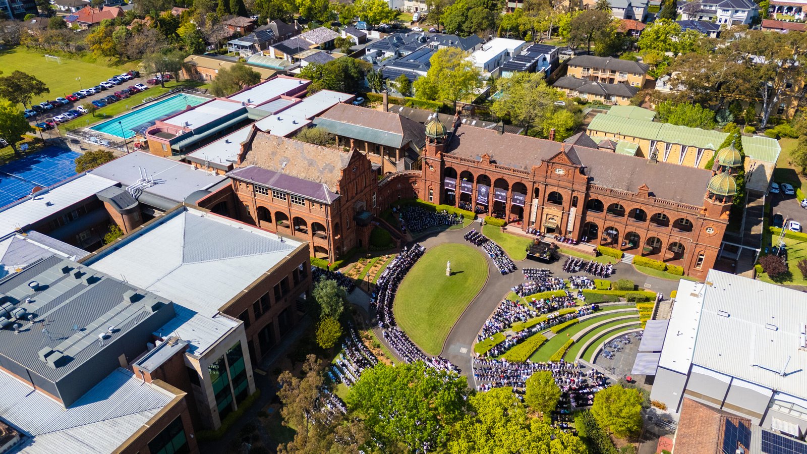 Aerial view of year 12 graduation and school grounds.